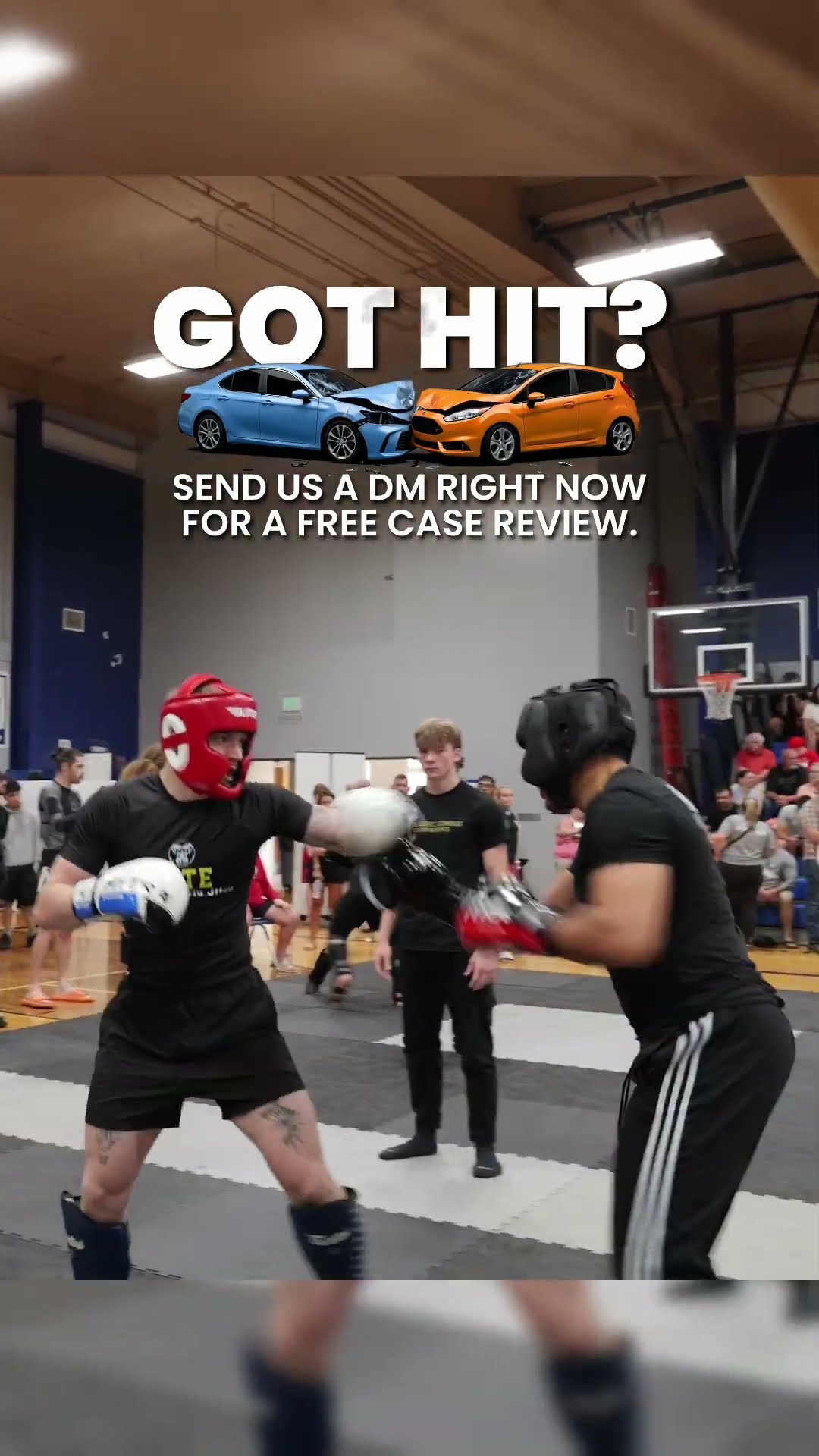 Two fighters in headgear squaring up on the mat at a Classic Combat tournament